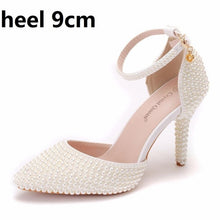 Load image into Gallery viewer, Crystal Queen Pointed Toe White Ivory Pearl Wedding Shoes Thin High Heels Pumps Bridal Ankle Strap Sandals Female Party Shoes