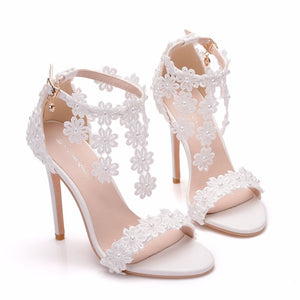 Crystal Queen Women Ankle Strap Sandals White Lace Flowers Pearl Tassel  Super Heel Fine High Heels Slender Bridal Wedding Shoes